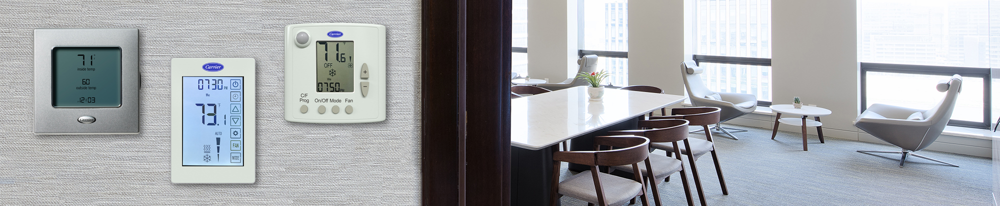 Thermostats on wall outside of room