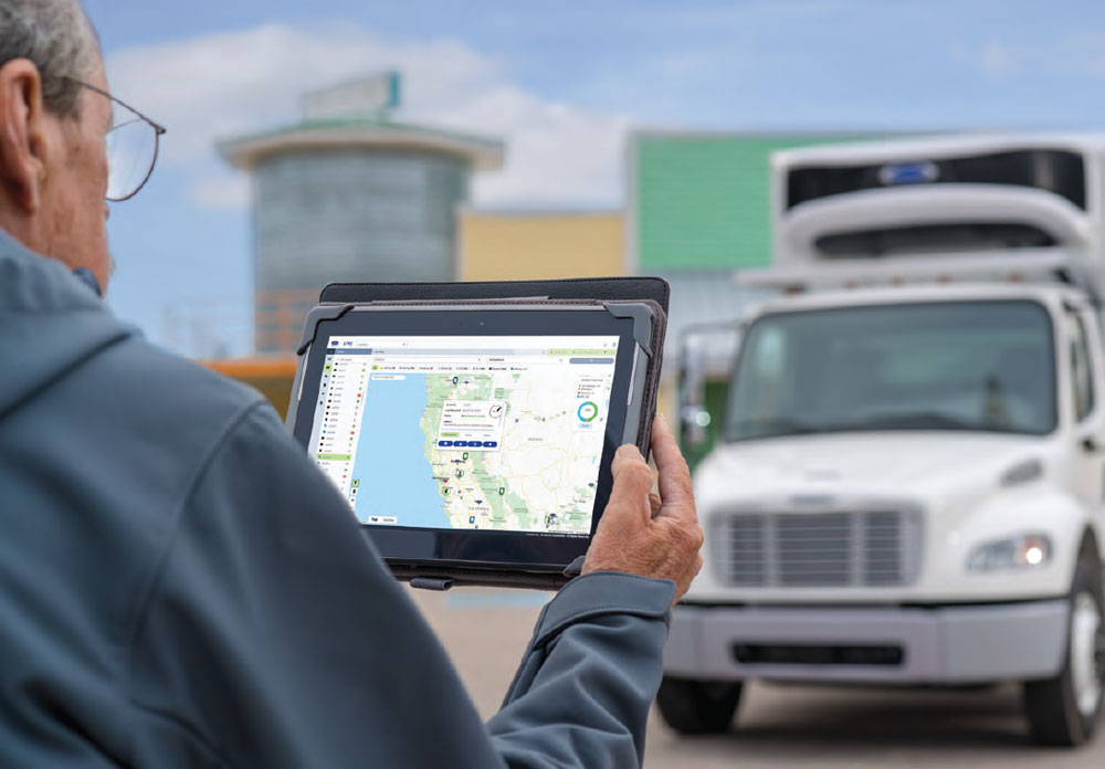 Man on tablet with Lynx fleet
