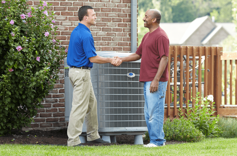 Man shaking hands with a Carrier employee.