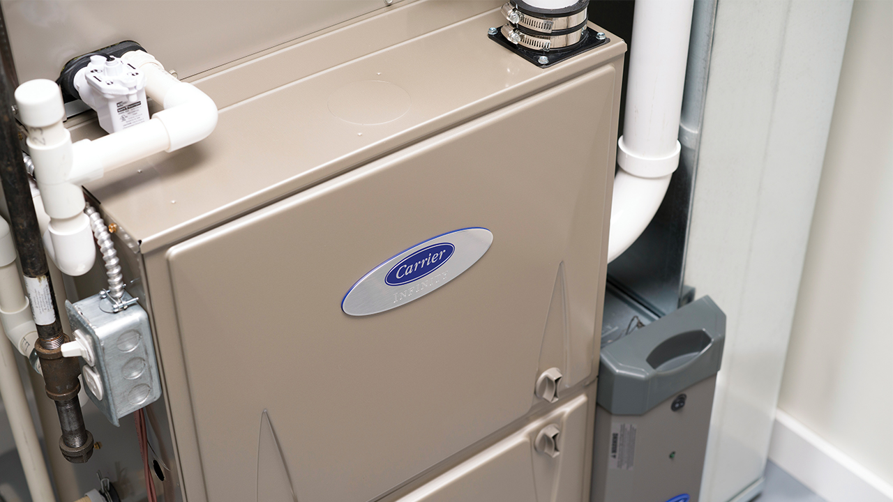 An installed Carrier Infinity furnace viewed from a top angle