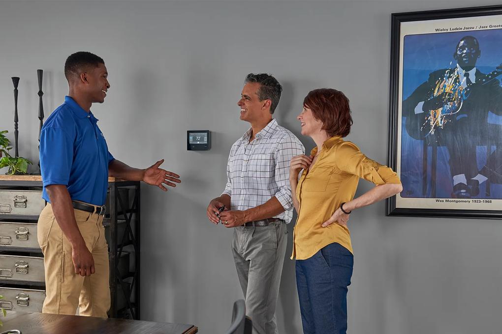 Carrier dealer installing new smart thermostat