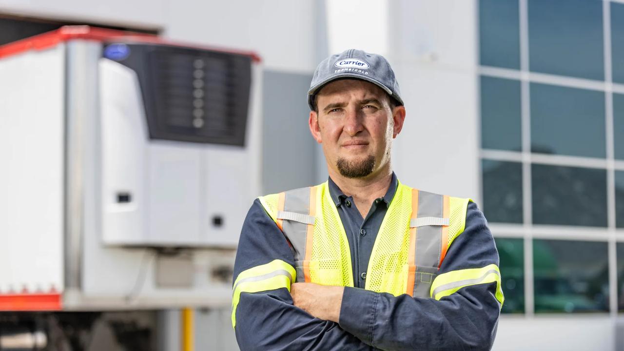 Container being moved by a lift truck