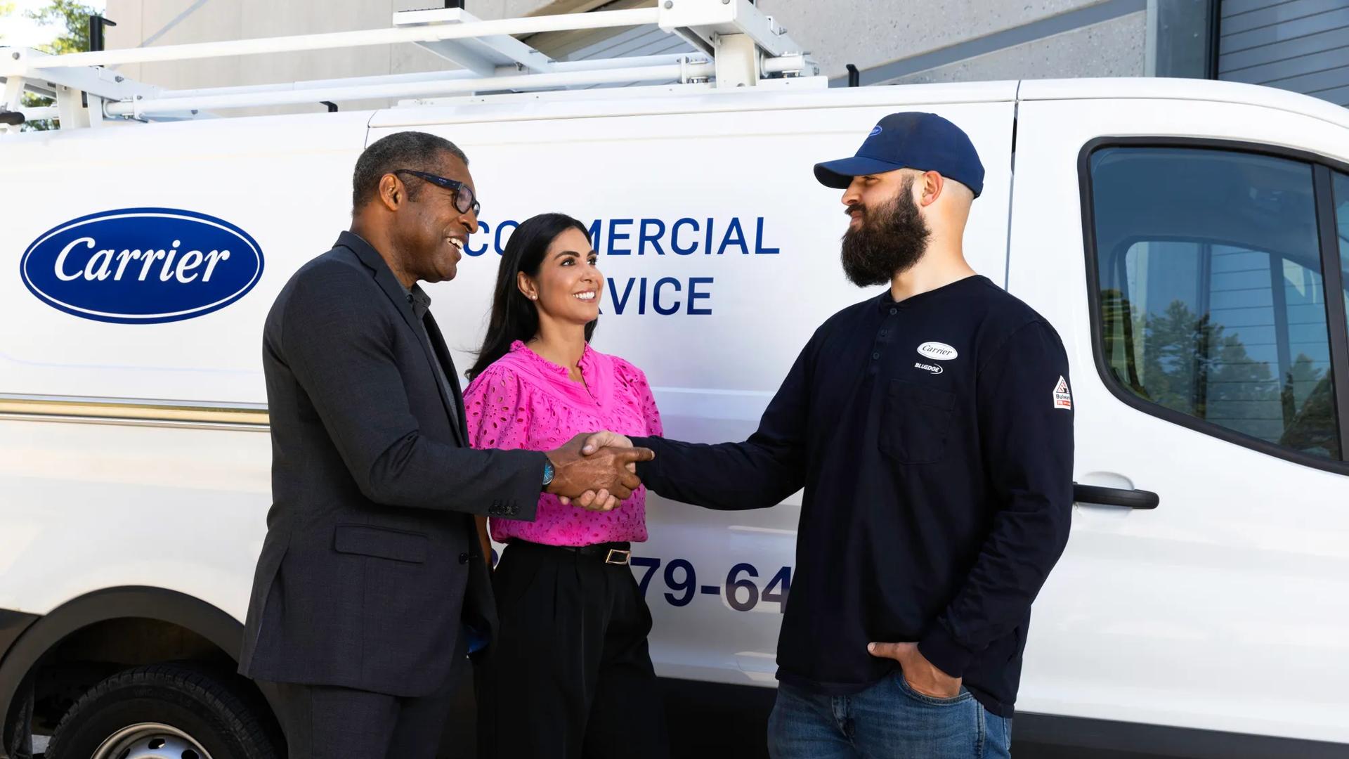 Service technician with a tablet in a mechanical-room