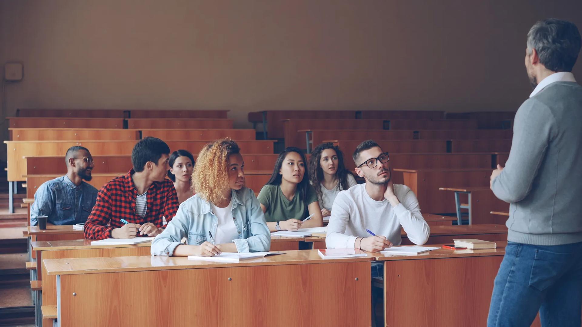 College students in classroom with professor