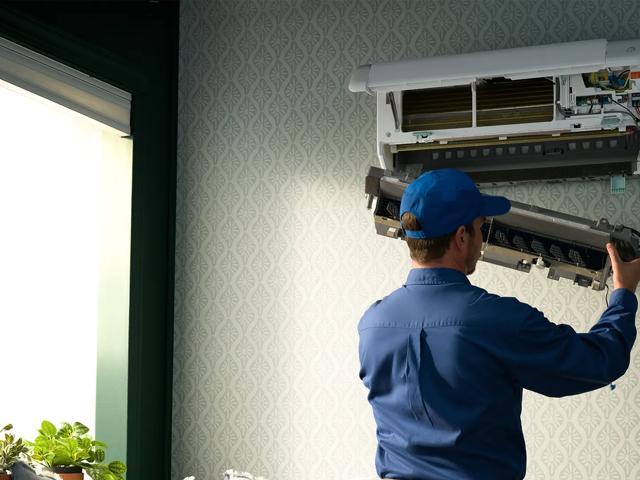 people in conference room discussing business