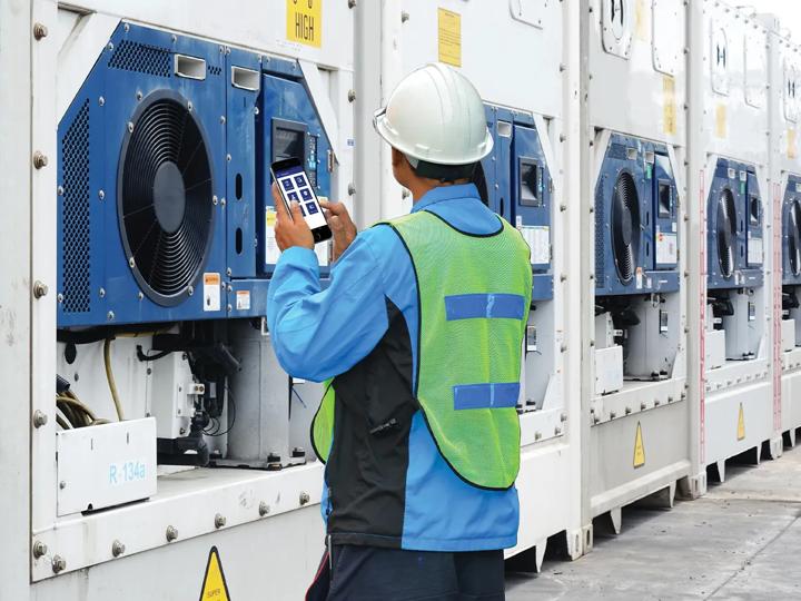 Man inspecting container