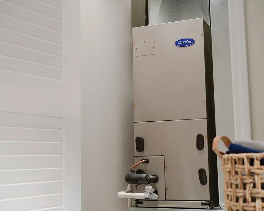 A Carrier fan coil installed in a closet