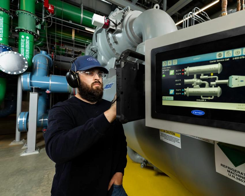 A group of young businesspeople walking down the stairs.