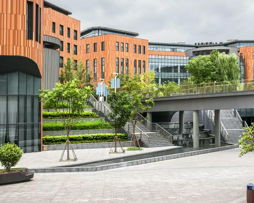 Photo of building with lush surrounding landscaping