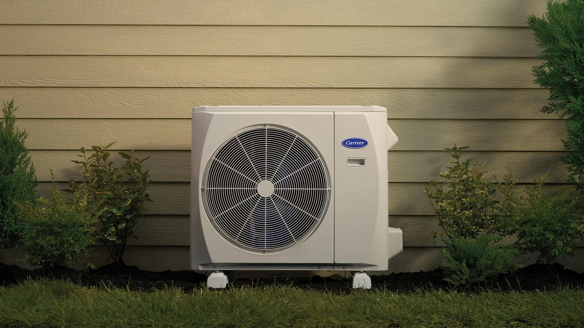 Crossover solution model 37MUHA installed outside a home with tan siding